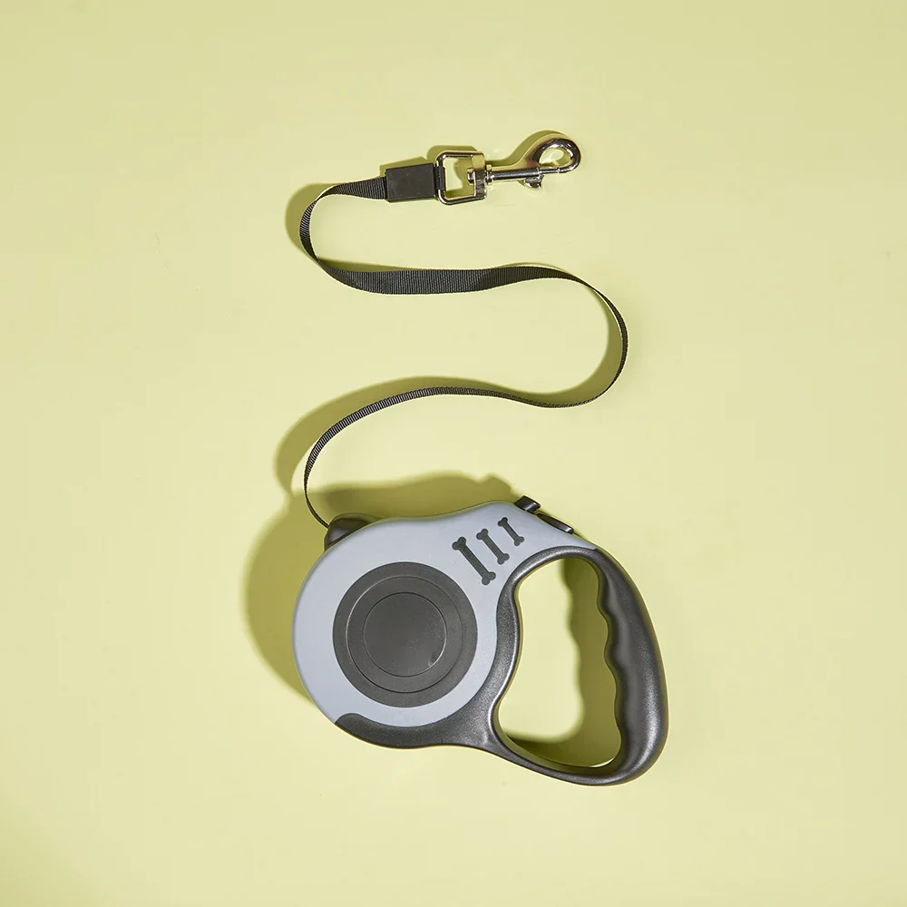 Intrekbare Hondenriem voor Kleine Huisdieren | Automatisch Snelontgrendelingsmechanisme | Duurzaam ABS en Nylon | Lichtgewicht | 3m/5m Opties | Voor Wandelen en Reizen | Geschikt voor Alle Seizoenen - Image 4